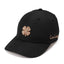 A black baseball cap featuring a glittery rose gold embroidered shamrock on the front and 'Live Lucky' script embroidery on the side, shown against a plain white background.