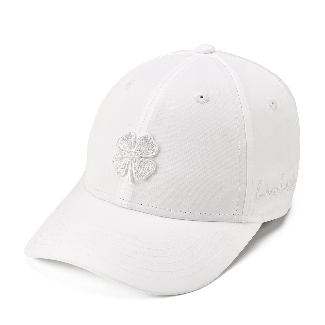 A white baseball cap featuring a glittery silver embroidered four-leaf clover on the front and subtle script embroidery on the side, set against a clean white background.