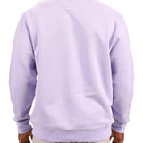man wearing an light purple colored sweater from Black Clover with a 3d text BLCK CLVR on the chest