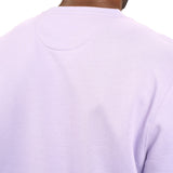 man wearing an light purple colored sweater from Black Clover with a 3d text BLCK CLVR on the chest