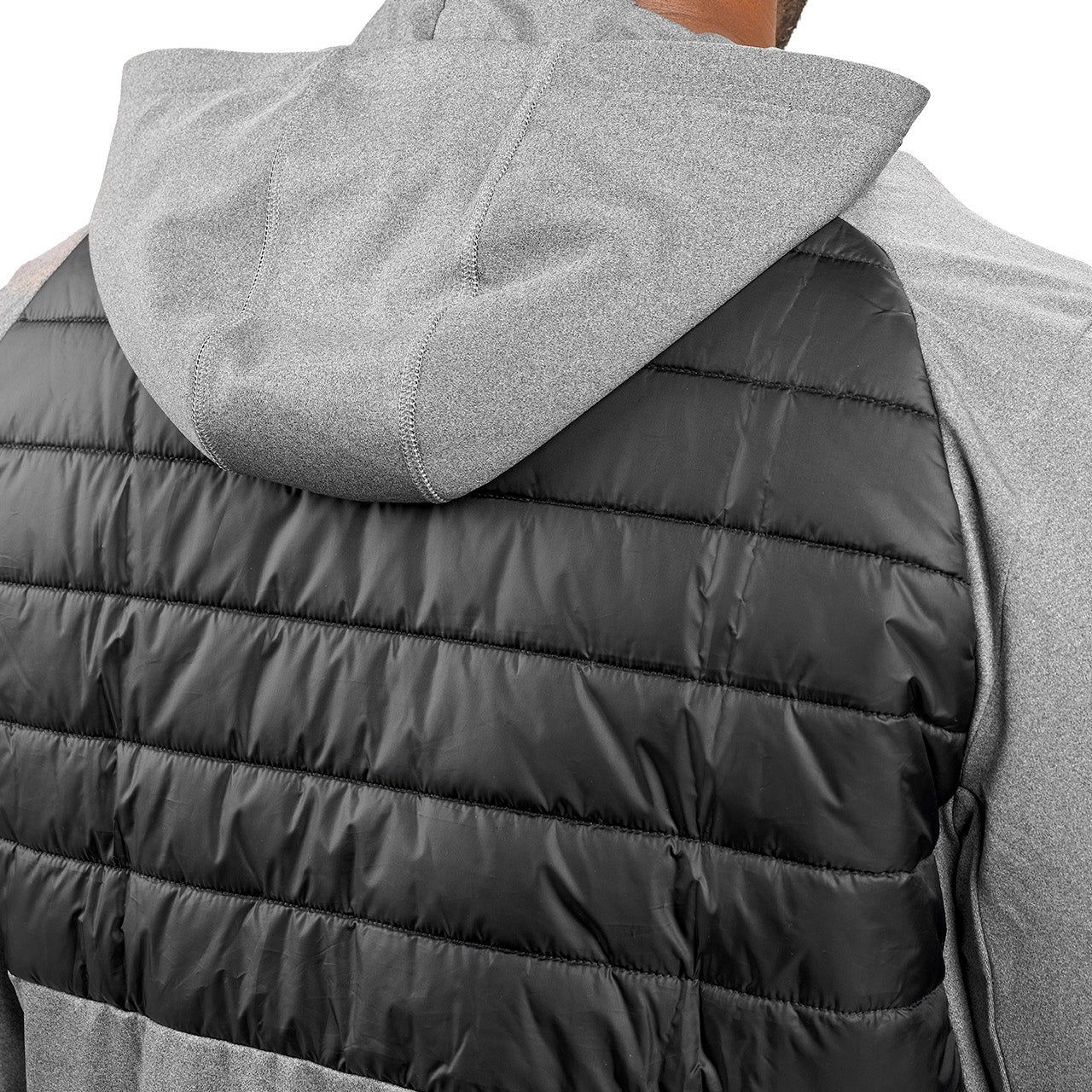 Man wearing black quilted jacket from Black Clover